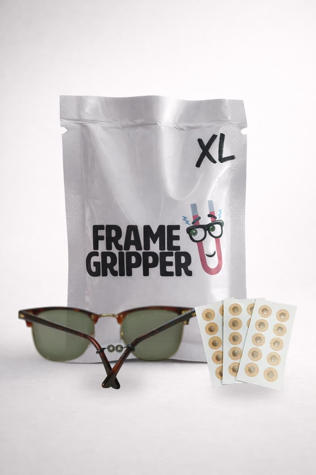 a white bag with sunglasses and a pair of glasses